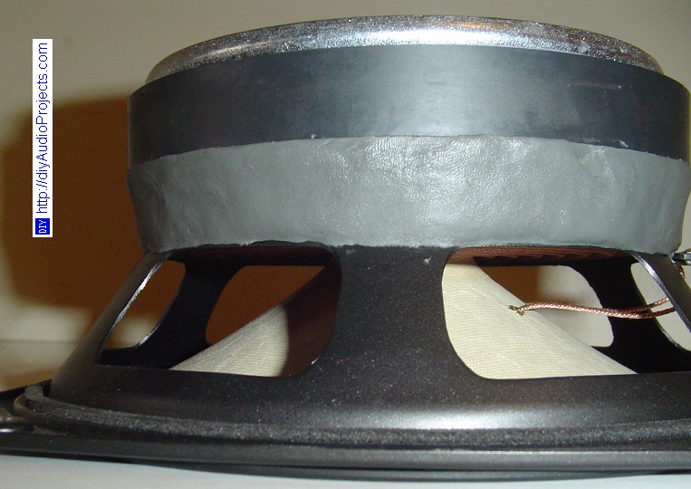 Duct seal putty used to dampen gap between the motor and the chassis
