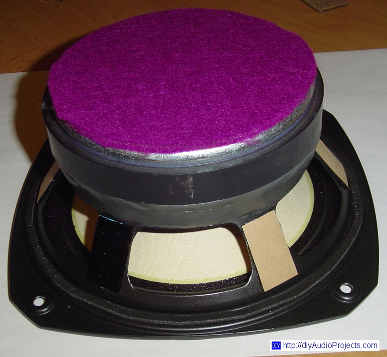 Speaker spokes dampened with rubberized asphalt